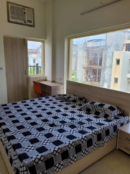 1RK fully furnished with double bed with mattress, almirah, kitchen chimney, chair and table.-3